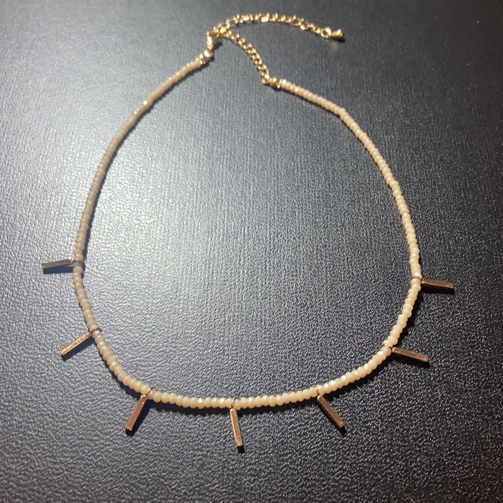 Cute adjustable off white and faux gold necklace